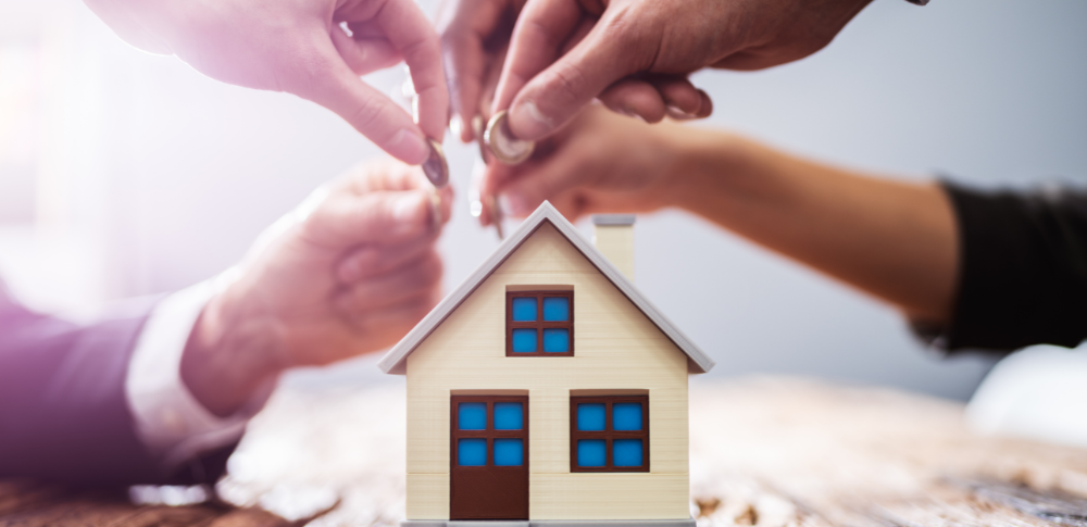 Alcancia en forma de casa pequeña